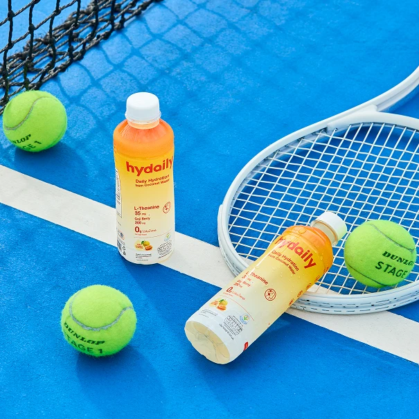 Hydaily coconut water on tennis court